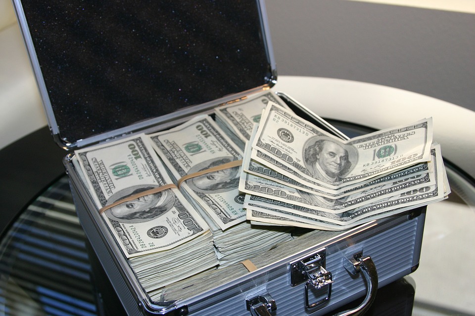 Suitcase full of Hundred Dollar Bills